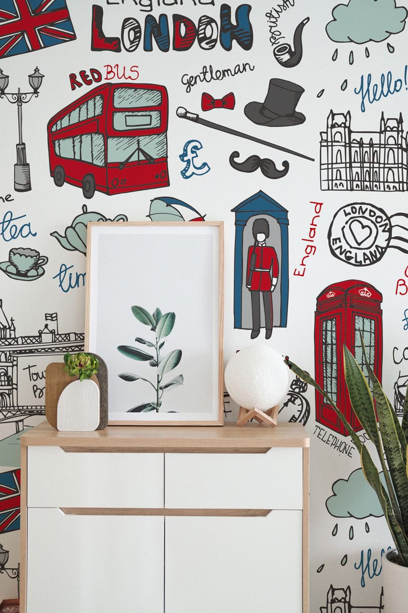 Charming London wallpaper with red, blue, grey motifs; white sideboard; plant decor; modern living space.