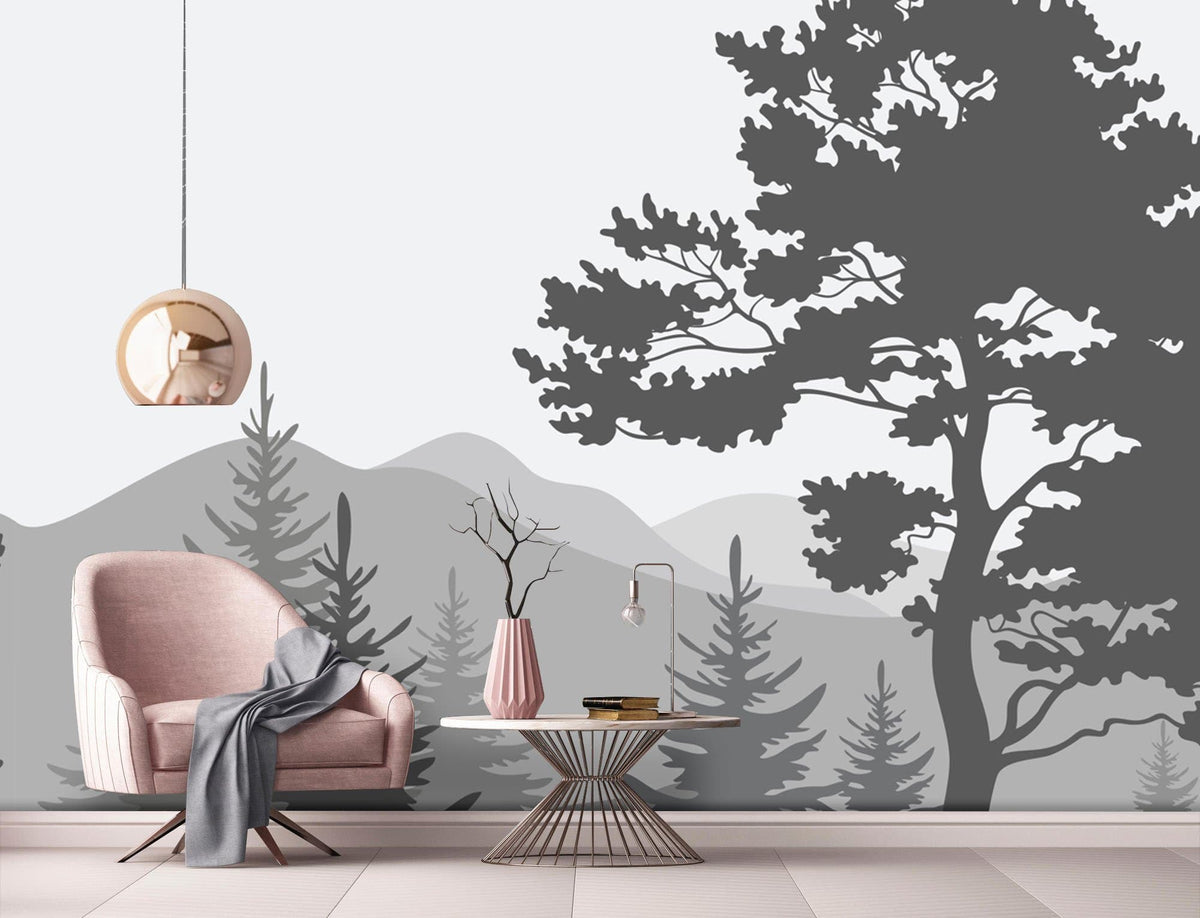 Tranquil grey forest mural wallpaper in modern living room with pink armchair, wooden flooring.