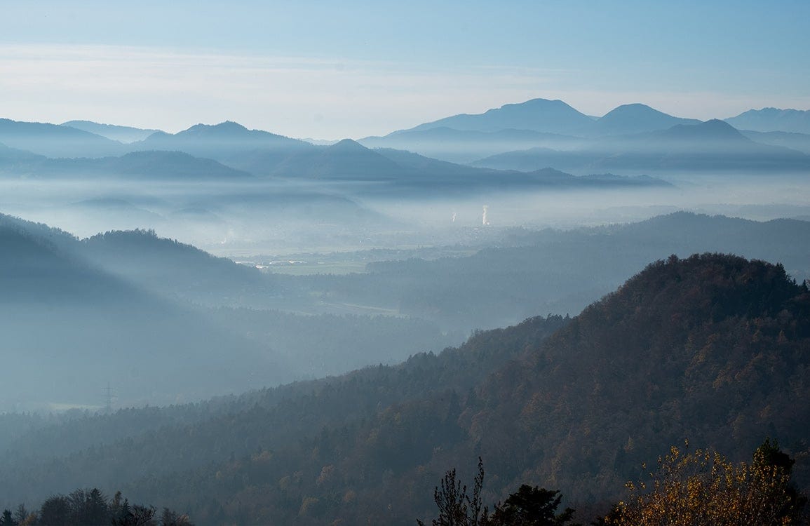 Serene Blue Mountain Mist Landscape Mural Wallpaper for Tranquil Interiors