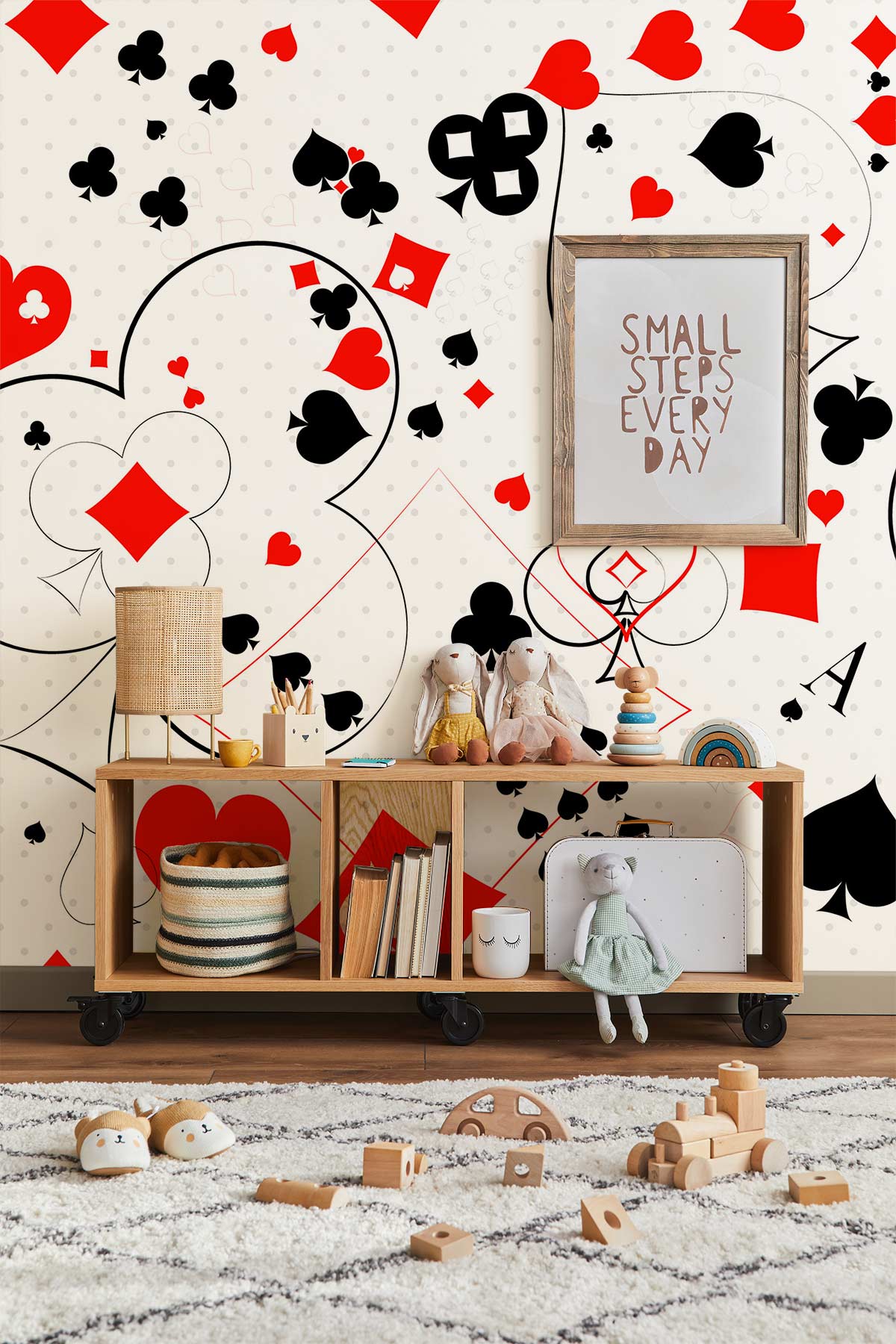 Vintage Playing Cards Motif Wallpaper in kids' room with light wood flooring and whimsical decor.