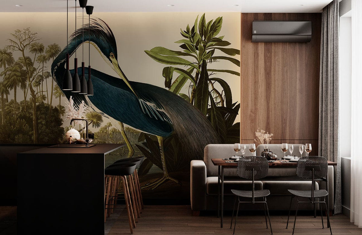 Elegant Blue Heron mural wallpaper in dining room with modern grey sofa, wood accents, and dark flooring.