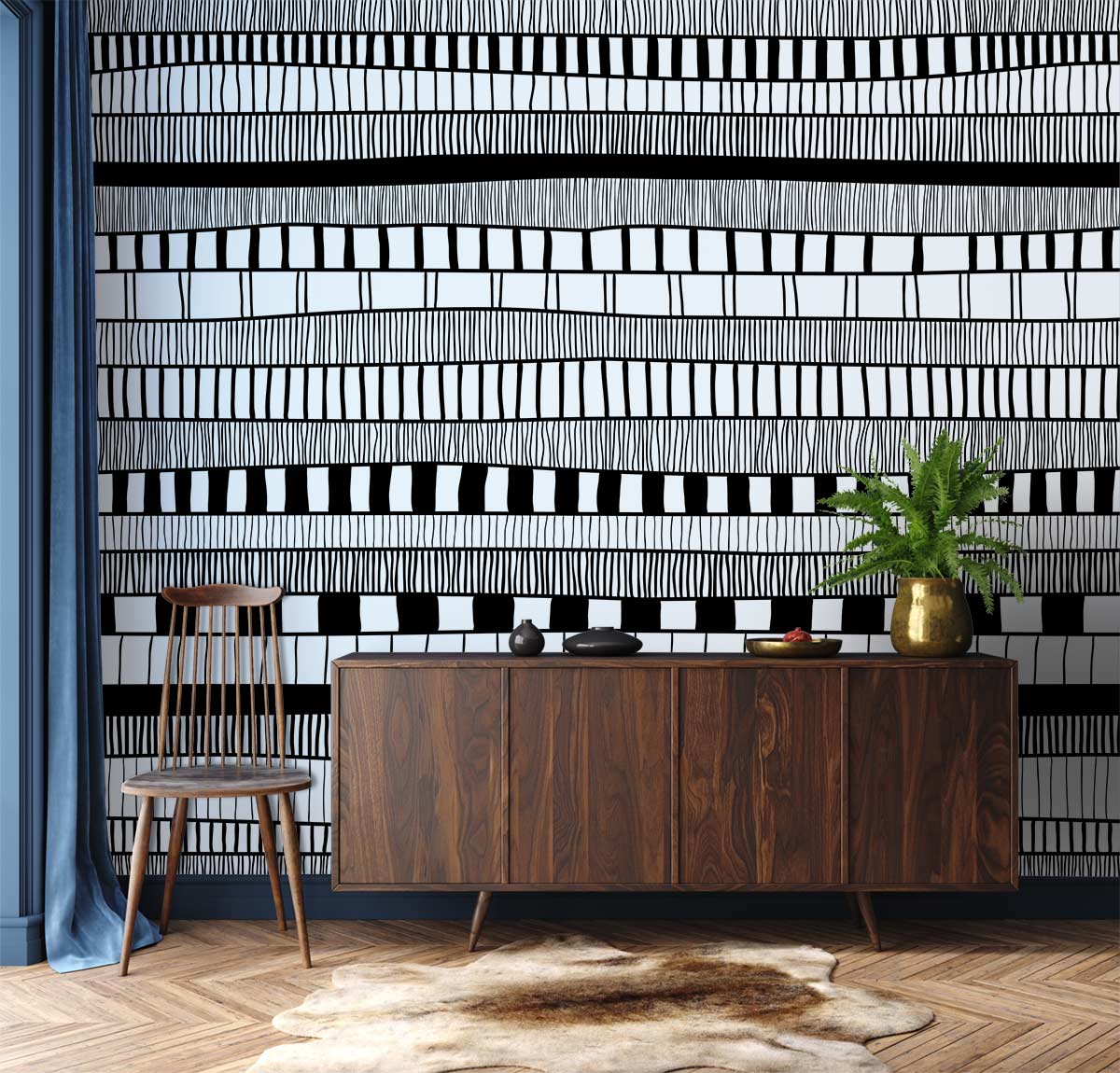Monochrome geometric wallpaper in living room with wood sideboard, chevron flooring, and a classic chair.