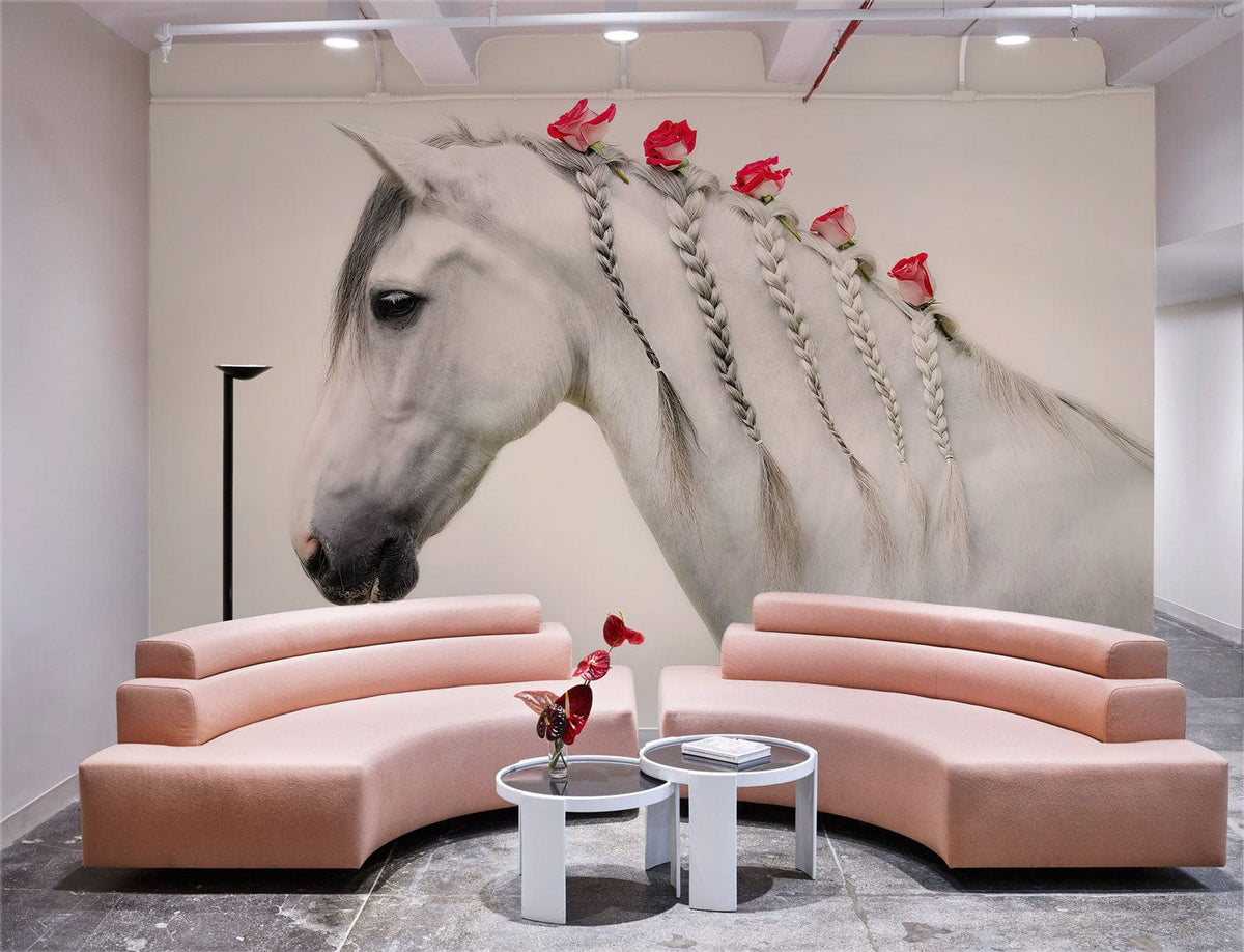 Elegant mural of white horse with braided mane, pastel shades, pink sofas, modern tables, and grey flooring.