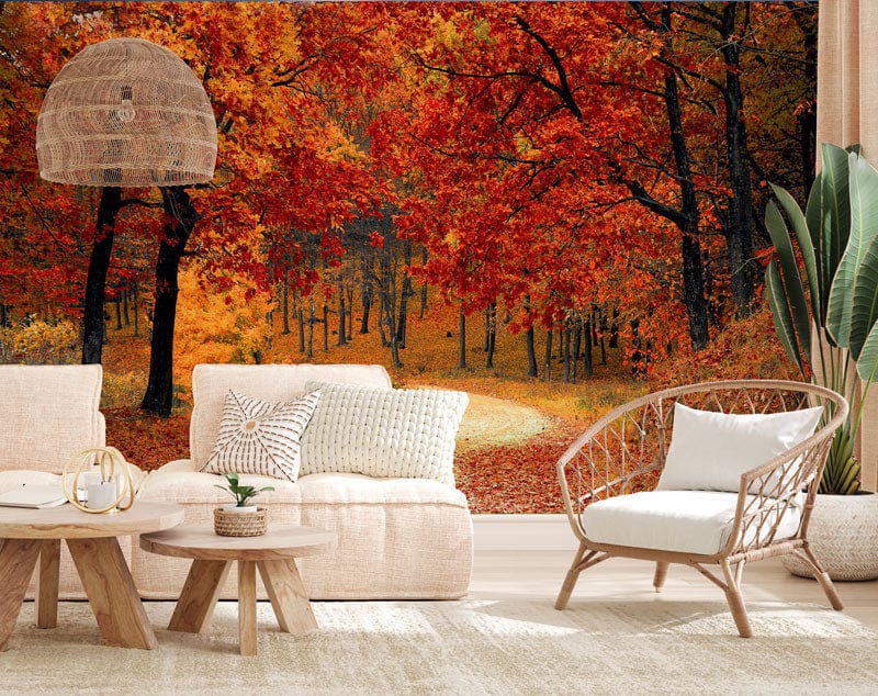 Rustic wallpaper with autumn forest design, vibrant orange-red, beige sofas, wicker chair, bright living room.