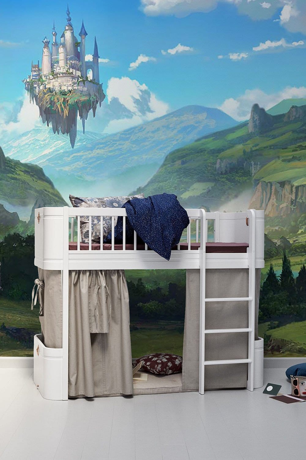 Children's room with Enchanting Floating Castle Landscape Mural Wallpaper, white loft bed, light wood floor.