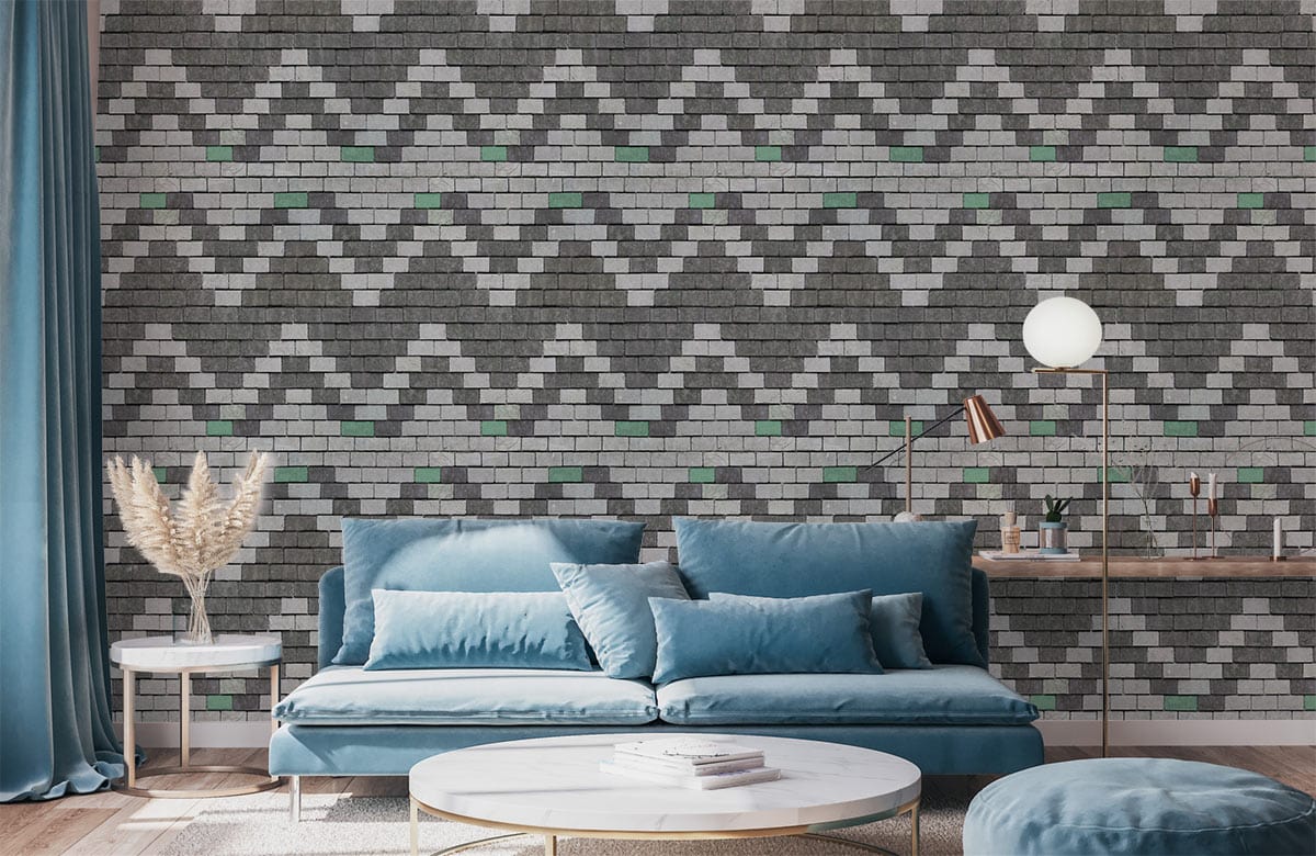 Geometric Grey Zigzag Brick Wallpaper in modern lounge with blue sofa, stylish lamp, and round table.