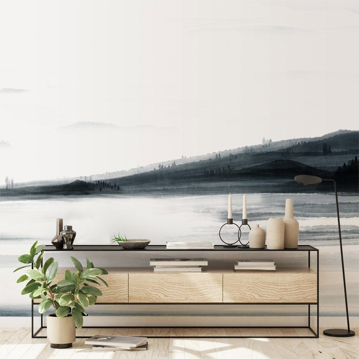 Monochrome misty landscape mural wallpaper in living room with wood console and stylish decor, serene design.