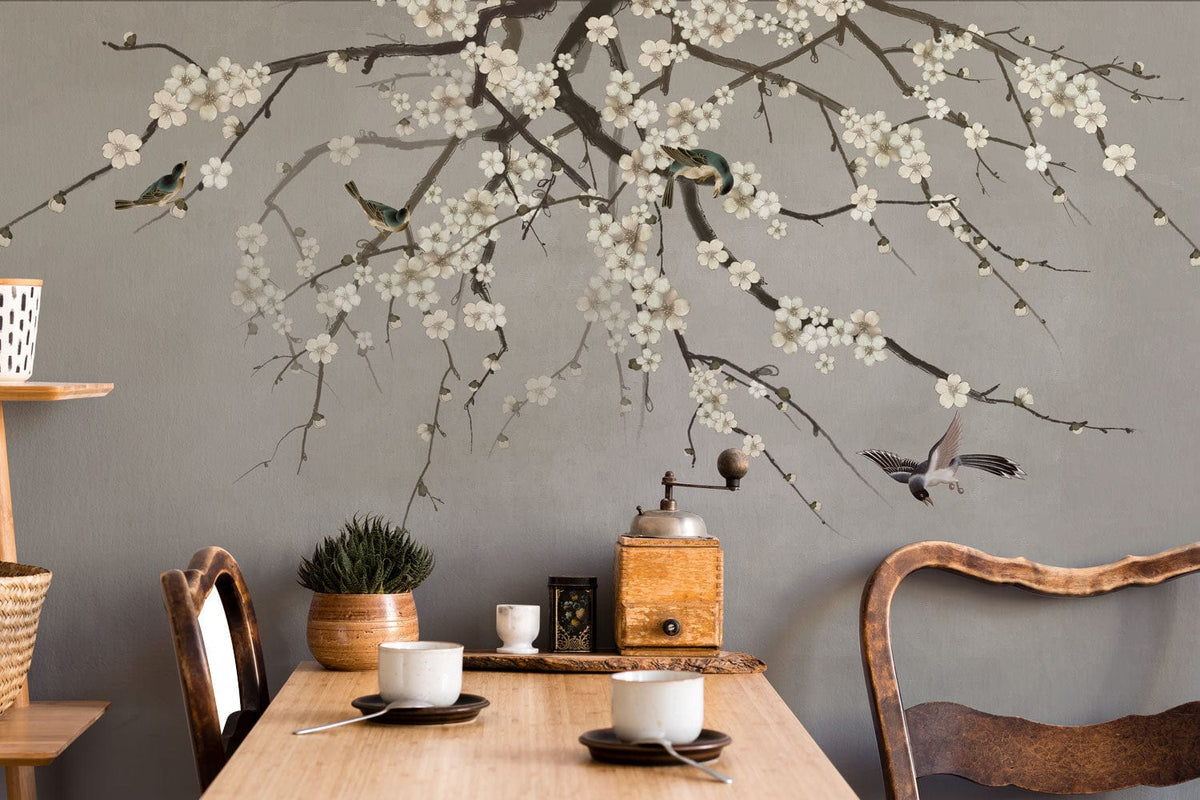 Elegant Blossom Branch Mural Wallpaper in dining room with wooden chairs, table, and vintage decor.