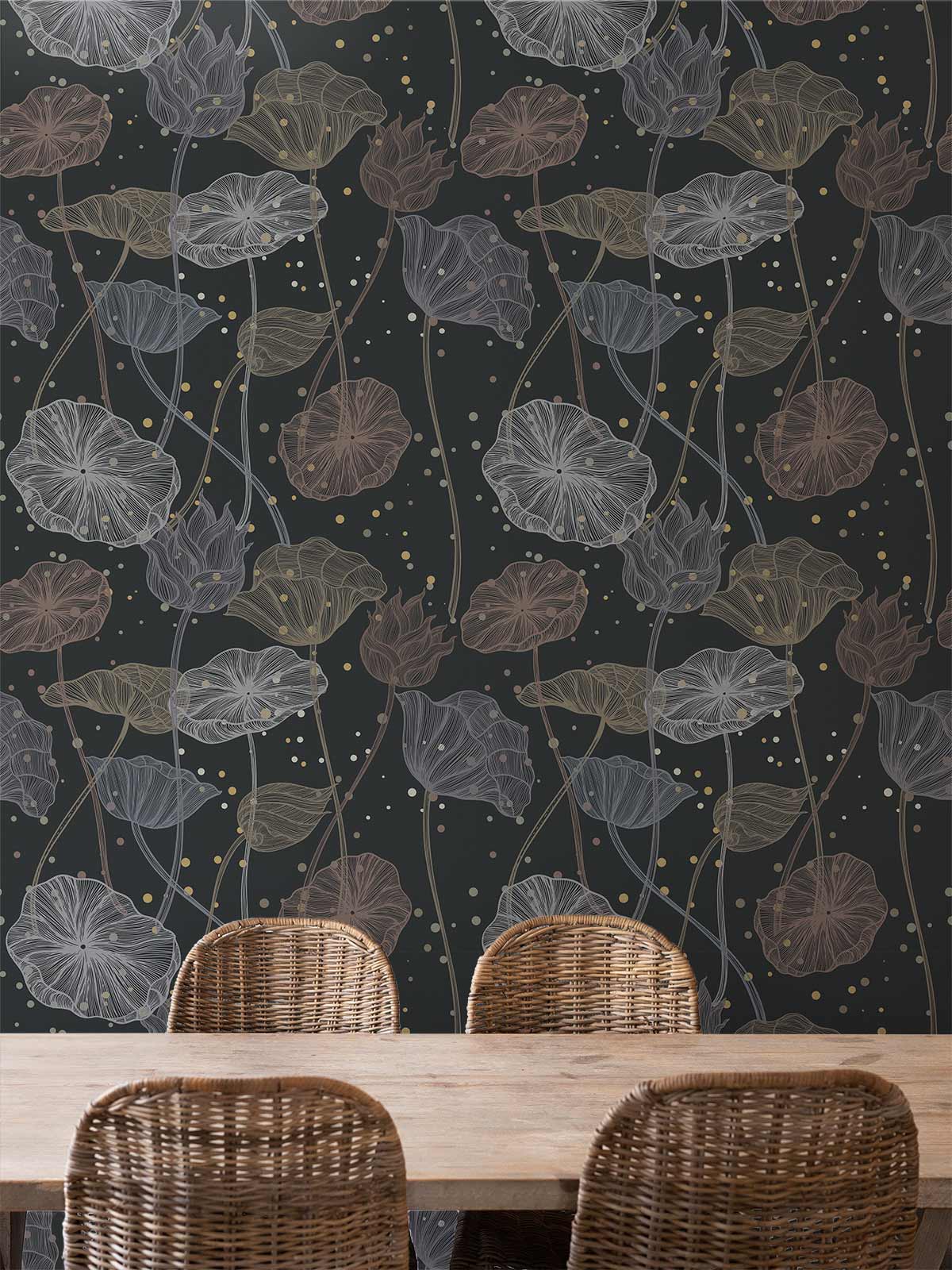 Elegant dark botanical wallpaper complements wicker chairs in dining room with wooden table and flooring.