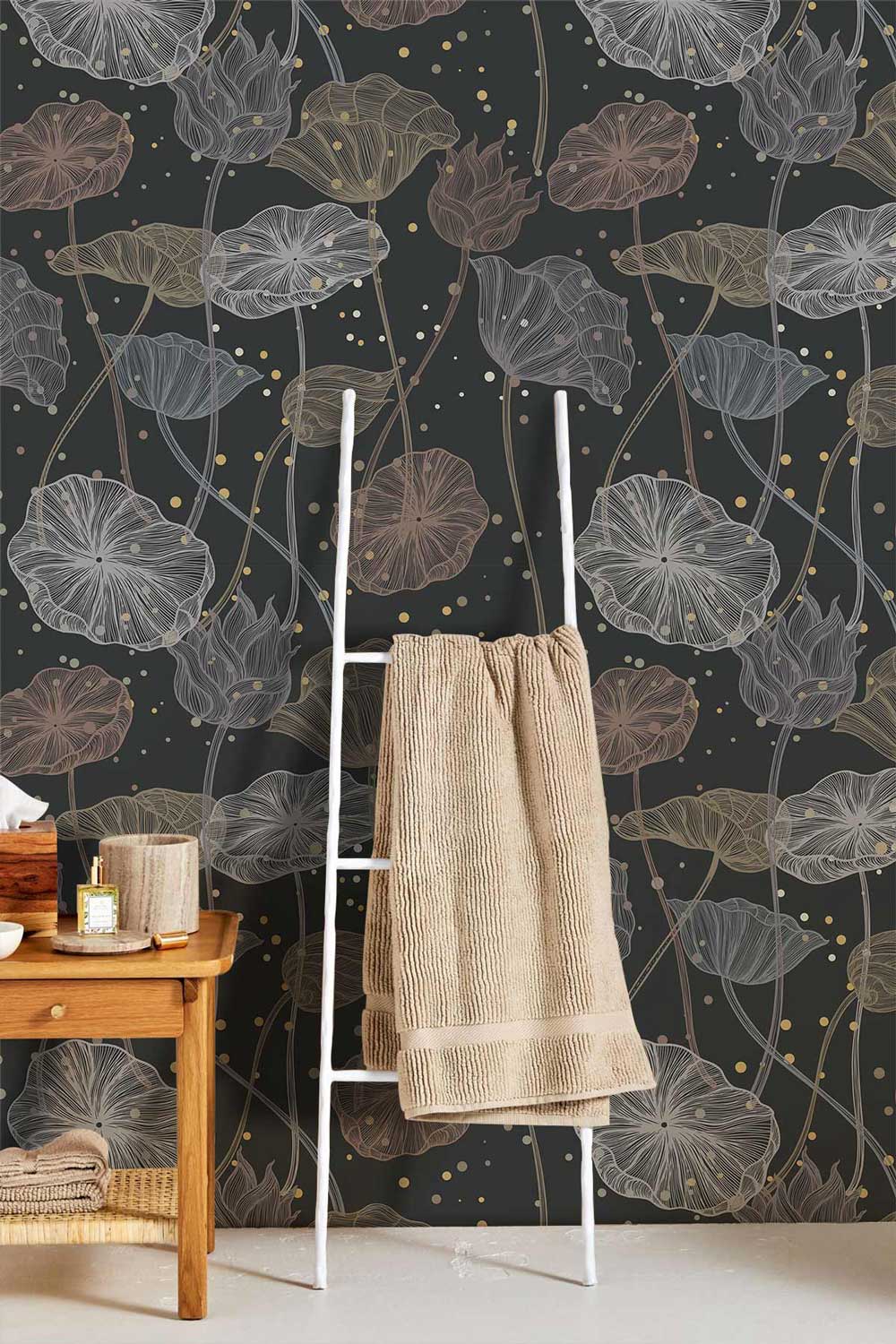 Elegant dark botanical floral wallpaper with earth tones, white ladder, and beige towel in living room.