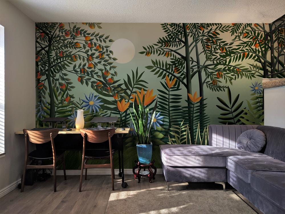 Tranquil Sunrise Forest Mural Wallpaper, grey sofa, wooden chairs, light wood flooring, living room setting.