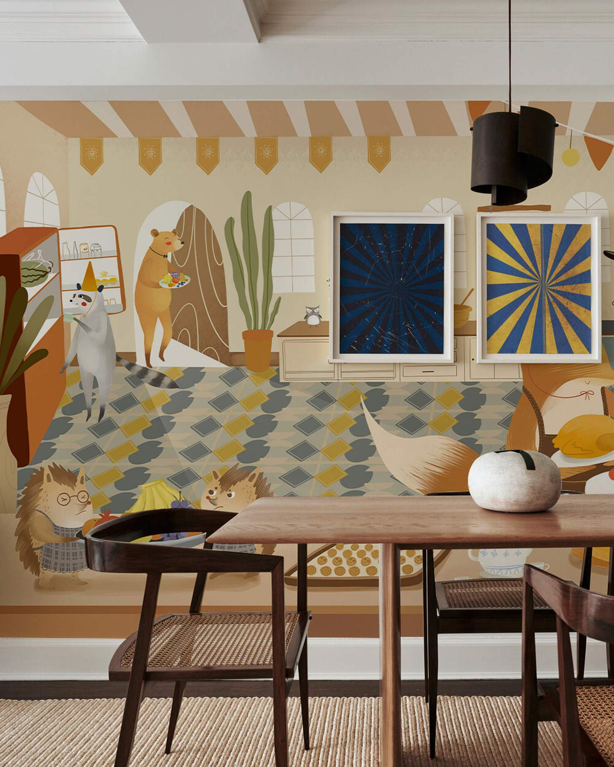 Charming woodland creatures kitchen mural wallpaper in autumn colours, wooden chairs, woven rug, pendant light.