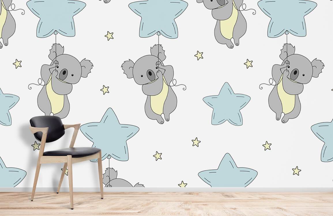 Grey Koala and Blue Star Nursery Wallpaper with modern chair on light wooden flooring. Children's room.
