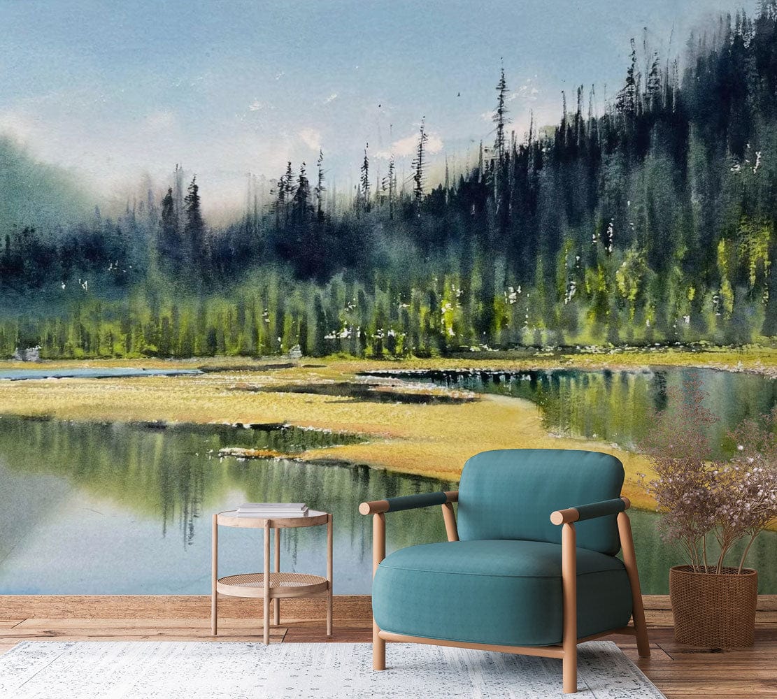 Green and blue watercolour mural wallpaper with armchair, side table, wooden flooring, living room setting.