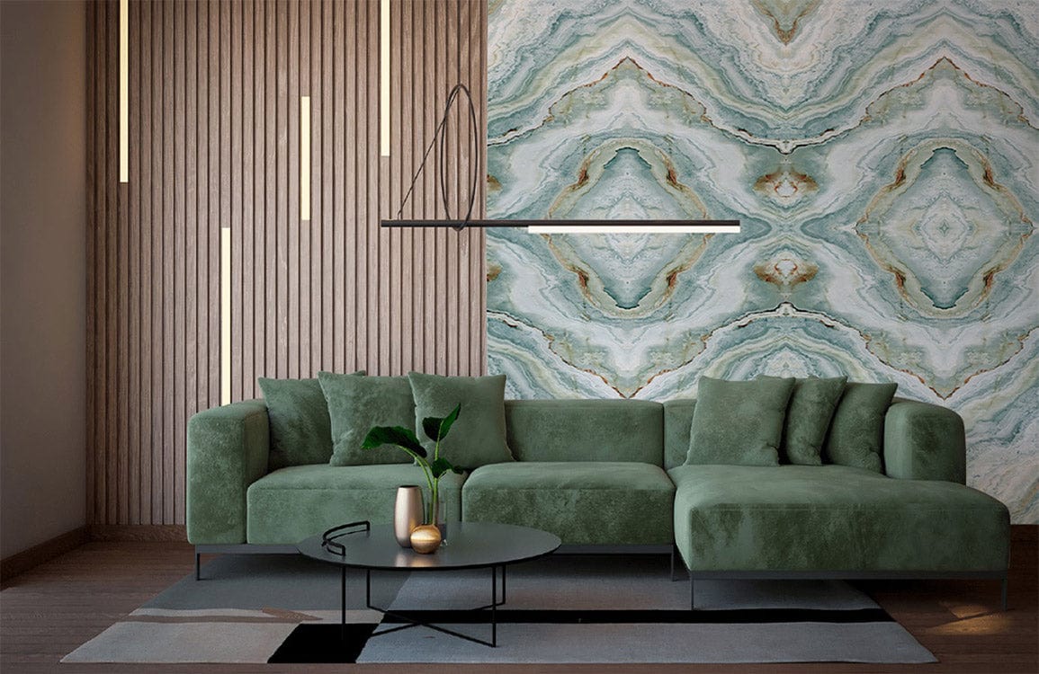 Elegant teal marble effect wall mural in modern living room with green sofa and wood panel accents.