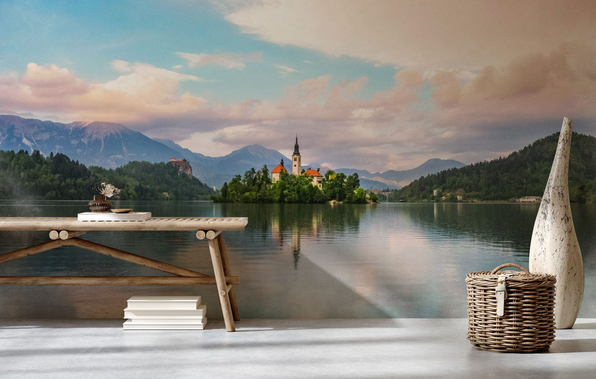 Tranquil mountain lake mural wallpaper with serene sunset hues, rustic bench, wicker basket, modern decor.