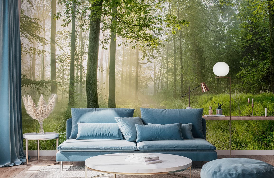 Blue sofa, forest mural wallpaper, wooden floor, modern decor, sunlit path, Enchanted Green Forest design.