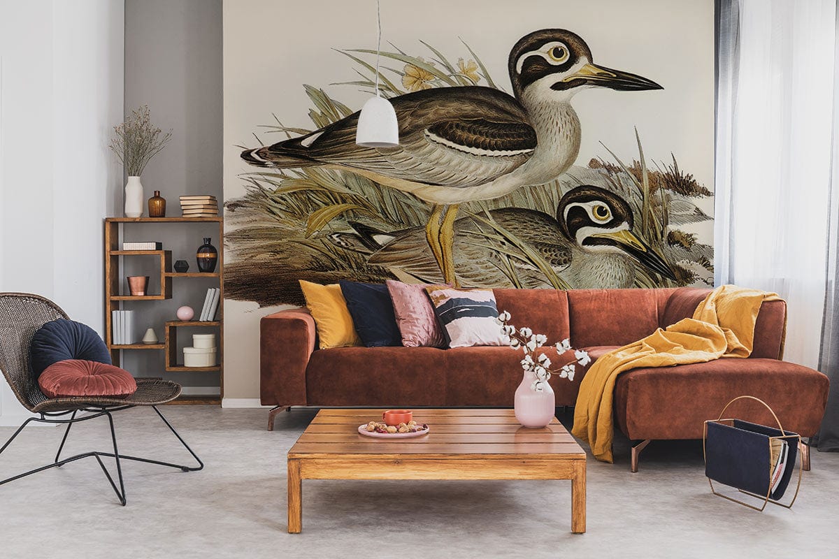 Vintage Wildlife Bird Mural Wallpaper, earthy tones; modern lounge, brown sofa, wooden table, shelving.