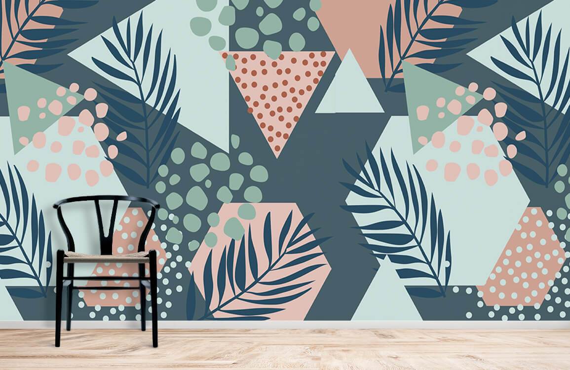 Geometric leaf-patterned wallpaper in soft pastels and navy tones with modern black chair on wooden flooring.