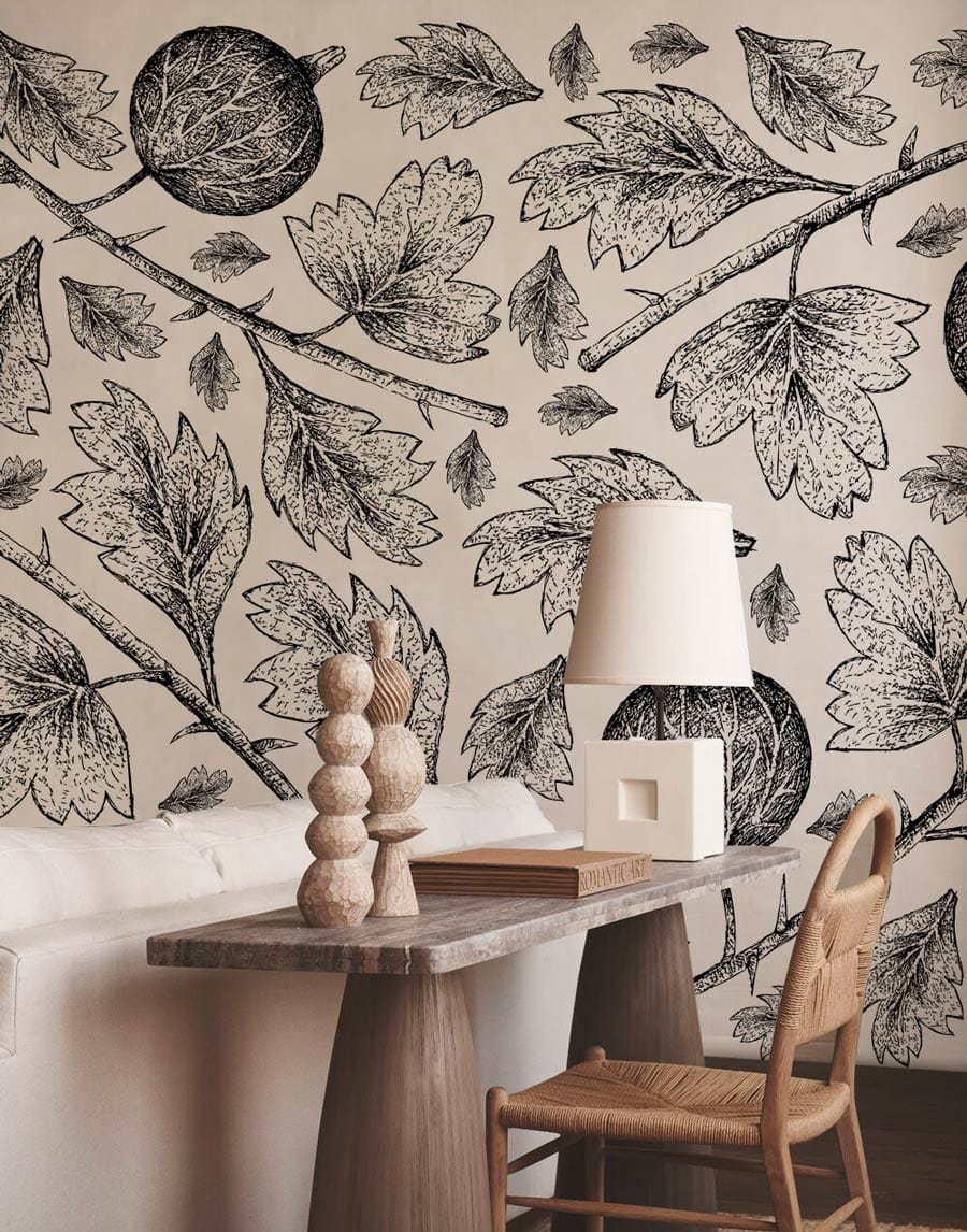 Black and White Botanical Fruits and Leaves Mural Wallpaper Design featuring rustic wooden table and chair.