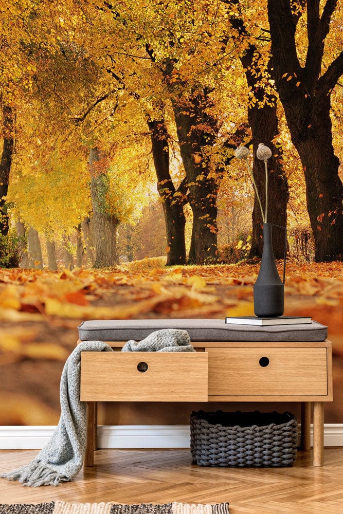 Golden Autumn Pathway Mural on wall, wooden bench, herringbone flooring, basket storage, and vase decoration.