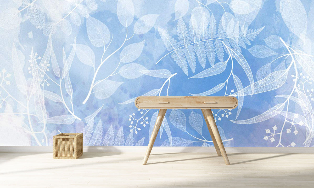 Tranquil blue botanical leaf pattern mural wallpaper with wooden desk and light wood flooring.