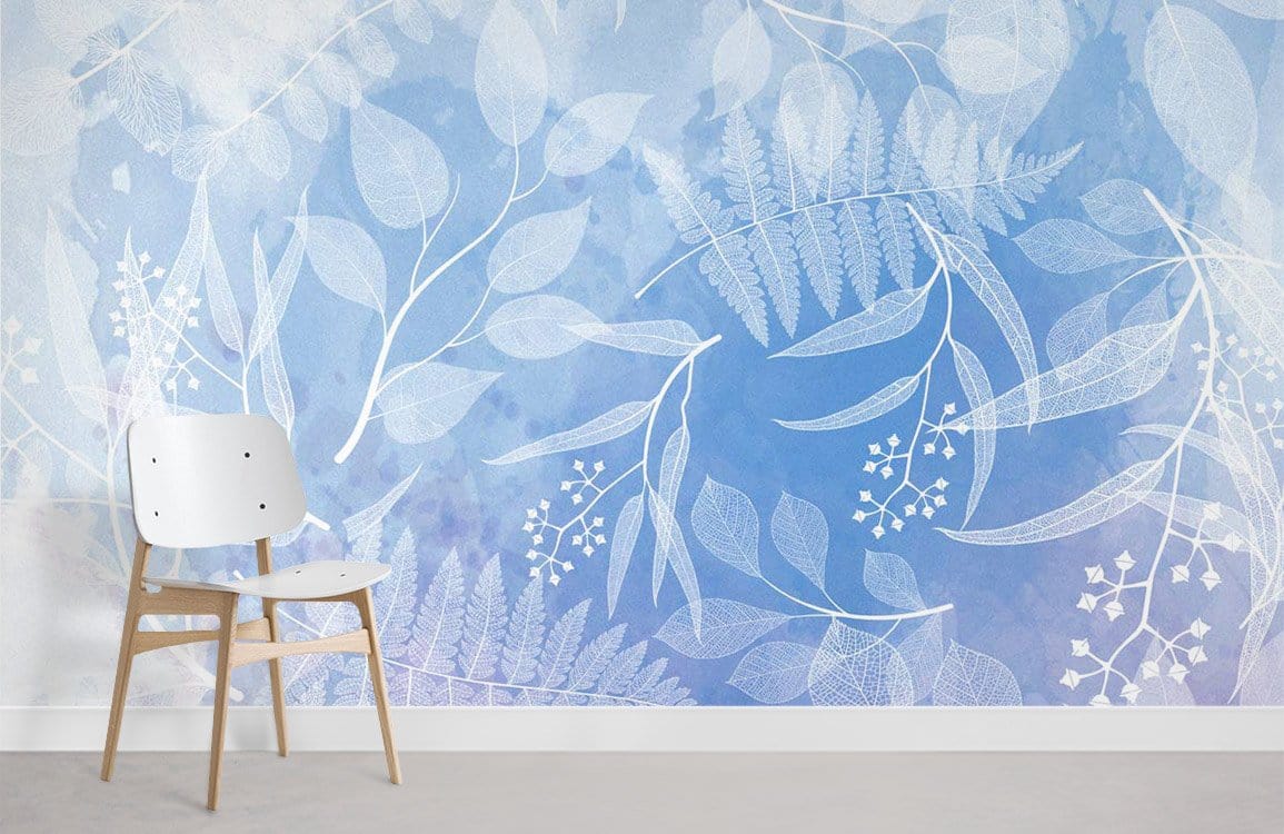 Chic Tranquil Blue Botanical Leaf Mural Wallpaper, modern light wood chair, grey flooring, serene design.