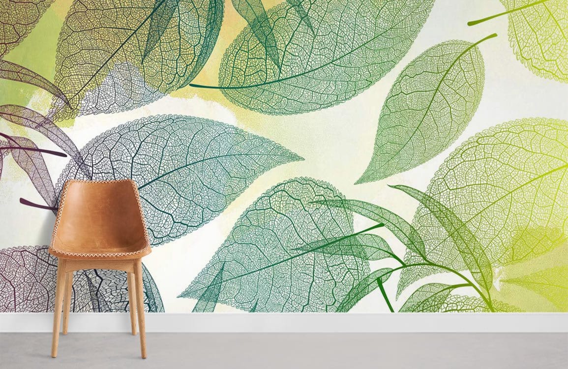 Organic Leafy Green Yellow Botanical Mural Wallpaper with brown leather chair, minimalist style, grey flooring.