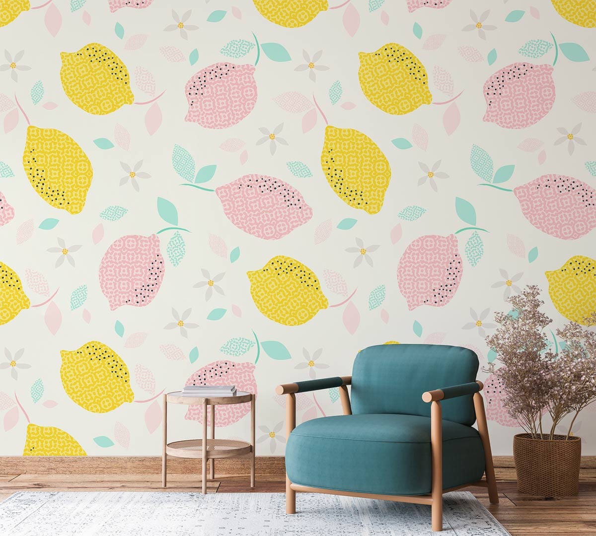 Colourful pastel lemon pattern wallpaper in living room with teal armchair, light wood flooring, modern decor.