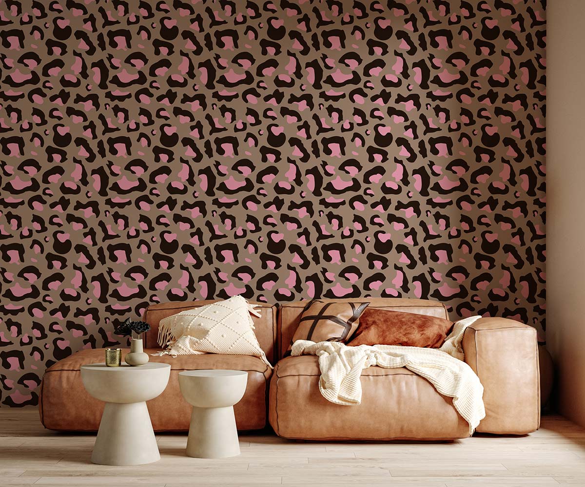 Pink and Brown Leopard Print Wallpaper, tan sofa, beige side tables, wooden flooring, stylish interior decor.