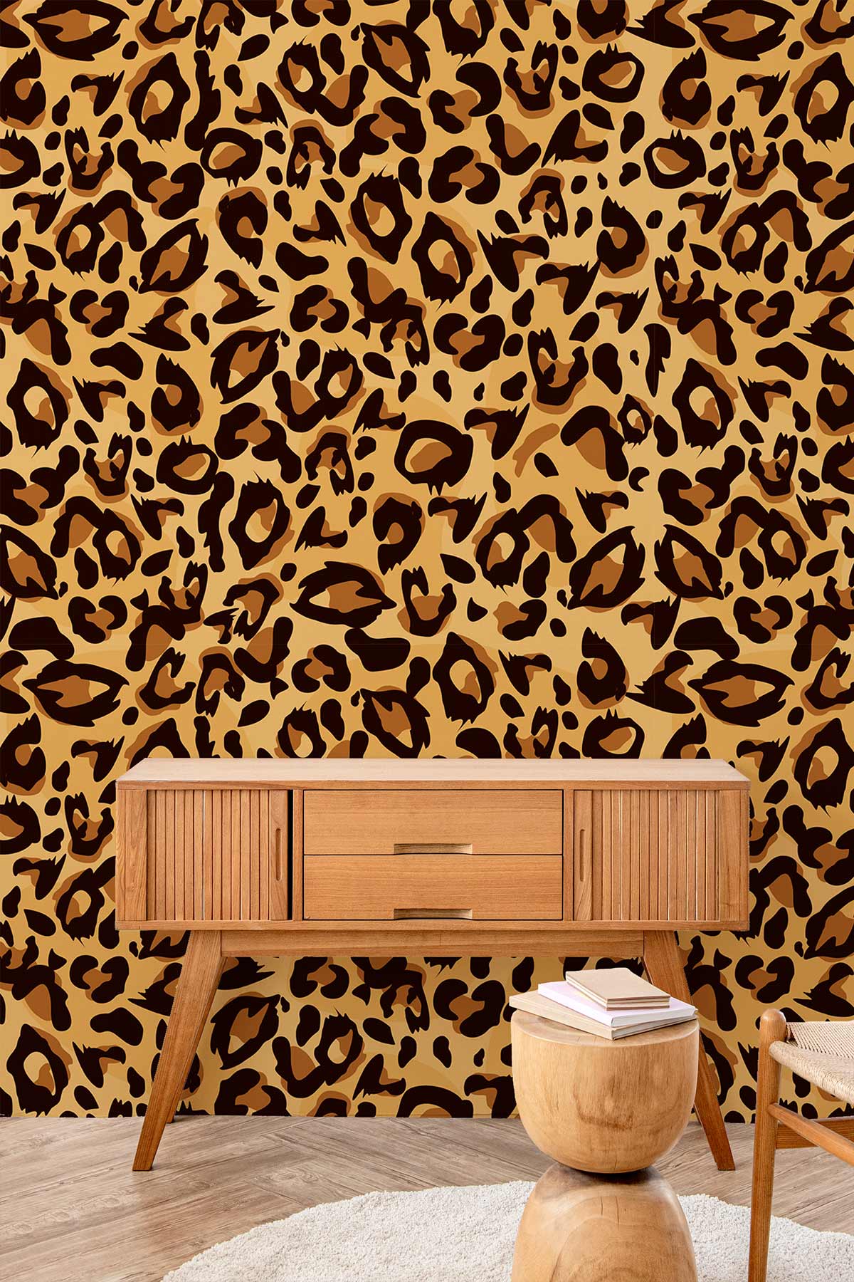 Leopard print wallpaper in brown and black, mid-century console table, light wooden flooring, modern decor.