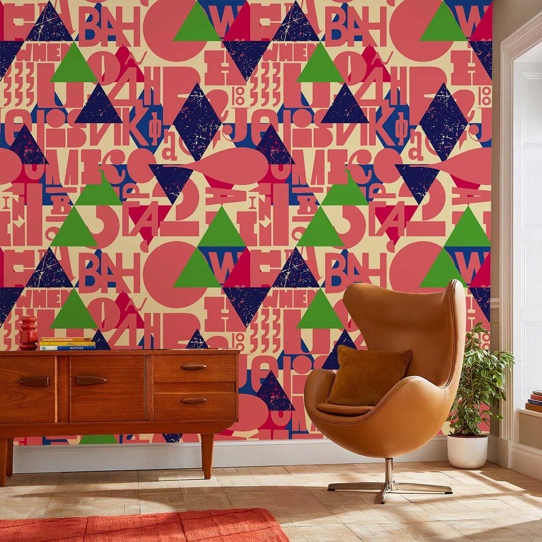 Vibrant retro geometric wallpaper enhances room with brown chair, wooden sideboard, and beige flooring.