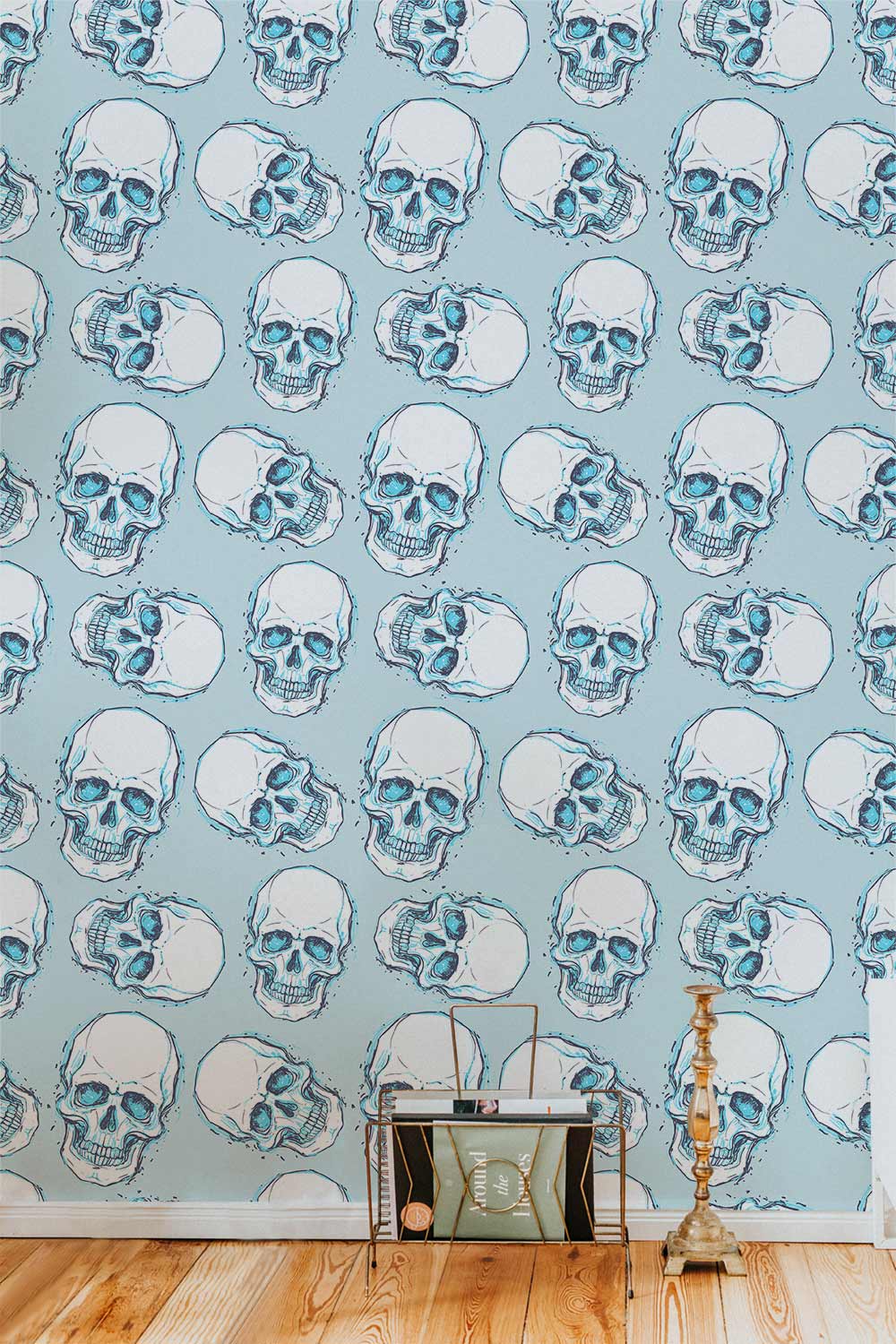 Edgy blue skull pattern wallpaper, gothic interior, wooden flooring, living room accent wall design.
