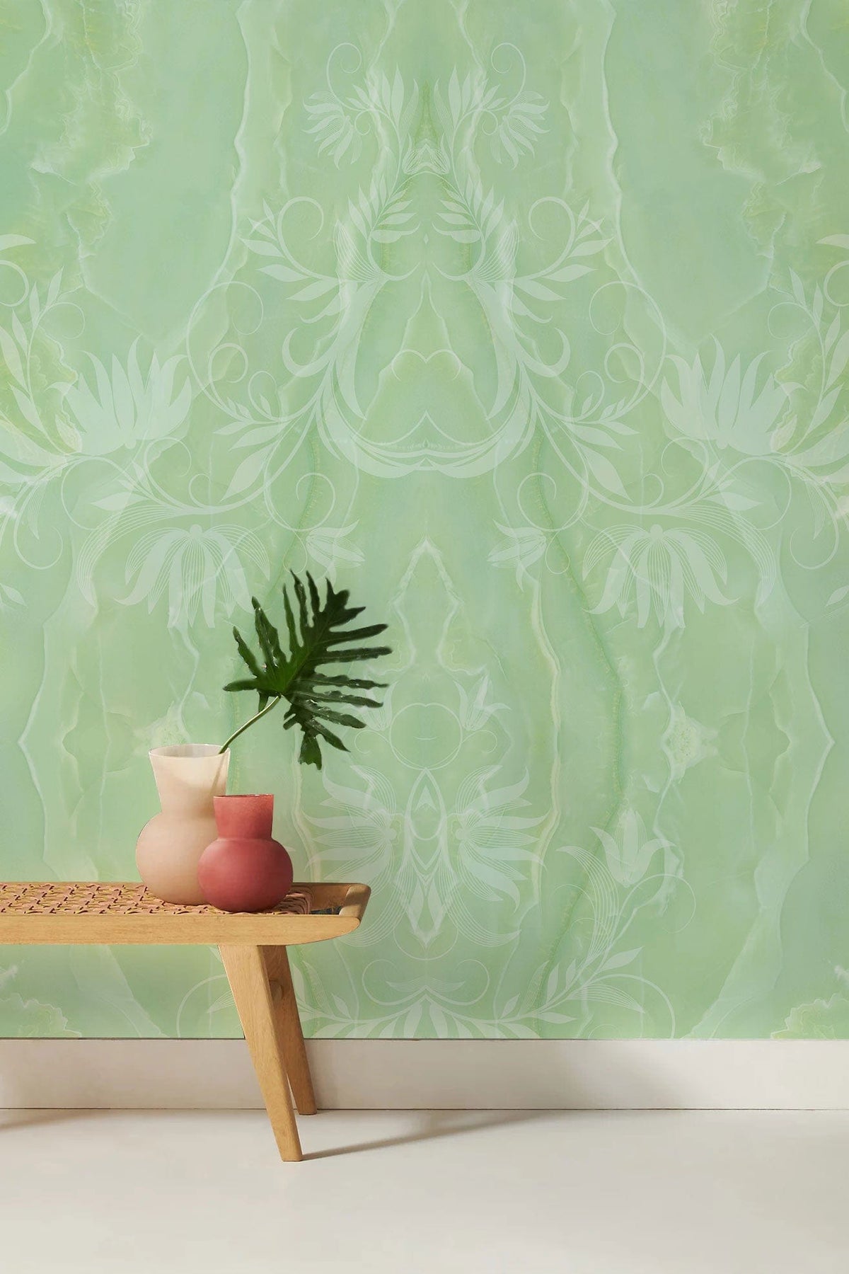 Elegant mint green damask wallpaper with floral pattern, wooden bench; ideal for classic interior design.