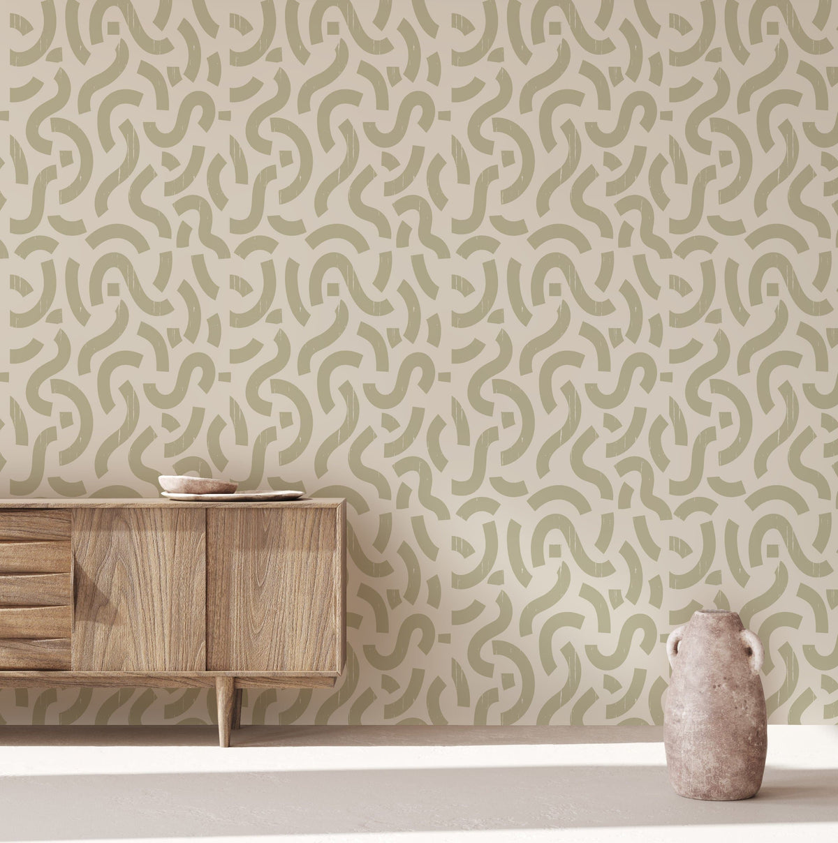 Elegant sage abstract wallpaper with minimalist design, wooden console, and vase in modern living room.