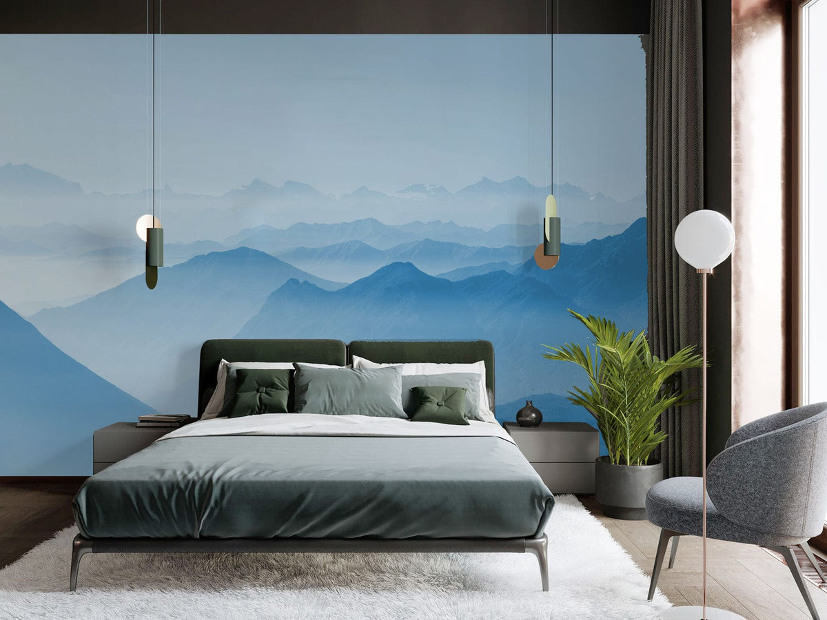 Tranquil mural wallpaper, serene bedroom, green bed, modern grey chair, light wood flooring, elegant decor.