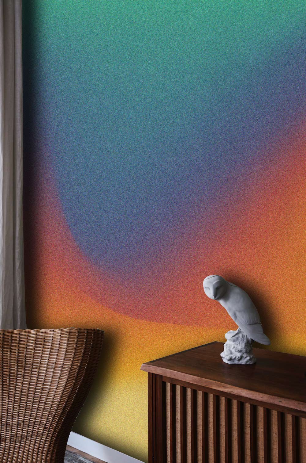 Vibrant Sunset Gradient Abstract Wall Art Mural with wicker chair and wooden console in living room.