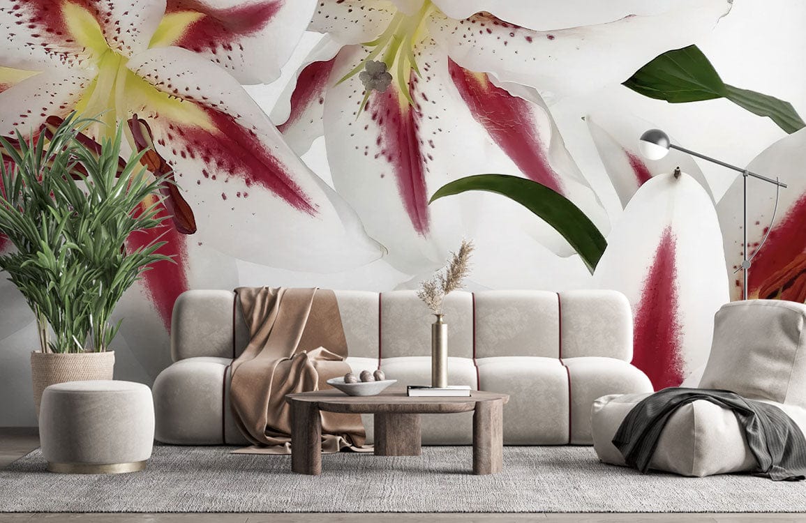 Elegant white lily wallpaper mural with red accents, modern sofa, grey rug, and lush green plant.