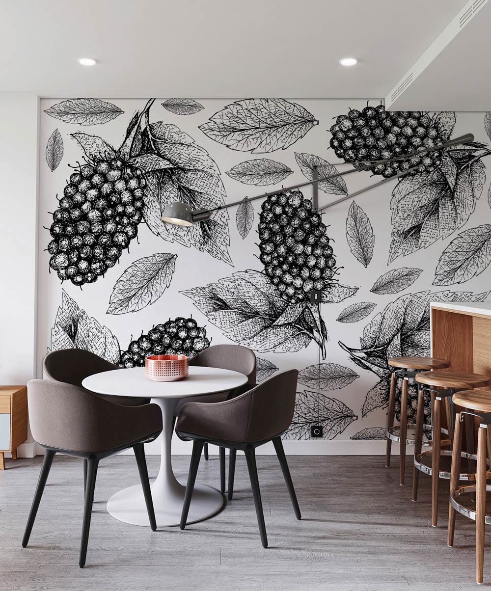 Monochrome botanical wallpaper, grey chairs, modern round table, wooden barstools, light wood flooring, kitchen.
