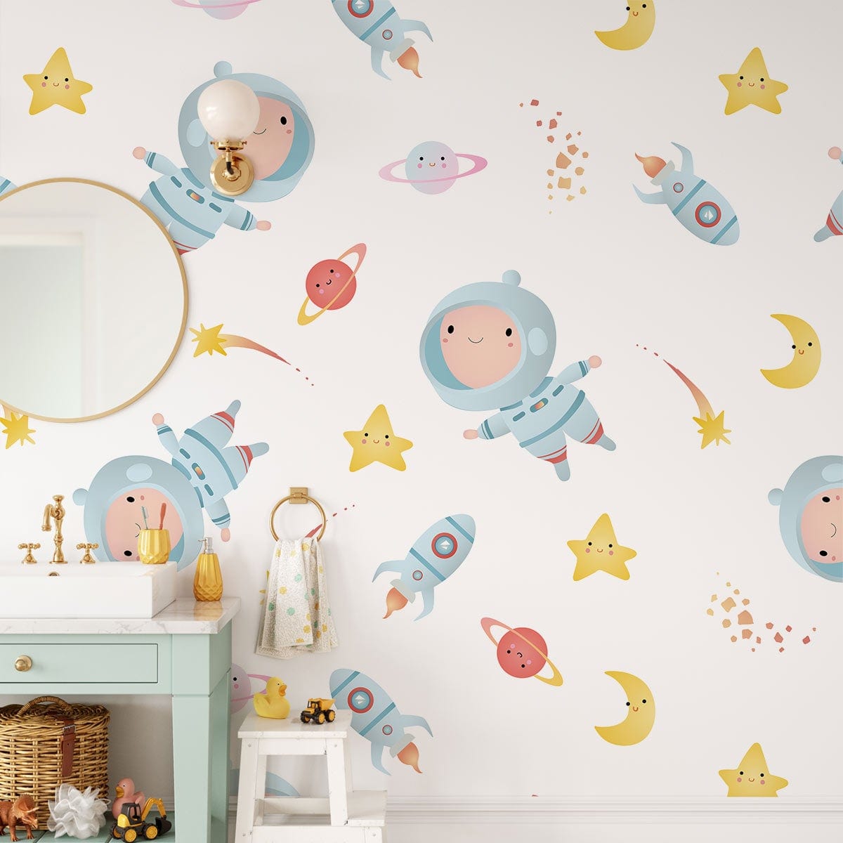 Charming Astronauts and Stars Kids' Bedroom Wallpaper in colourful design; white wall, mint vanity unit.