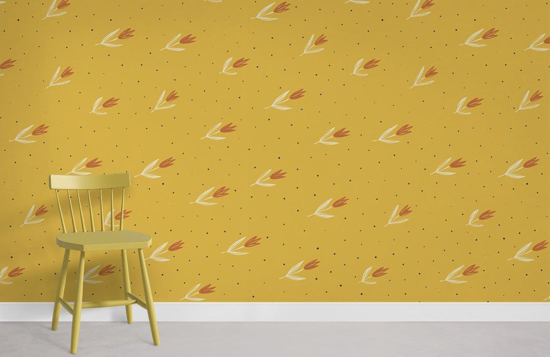 Vintage mustard floral wallpaper with retro tulip design, yellow chair, white skirting, grey flooring.