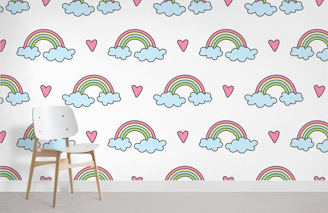 Whimsical pastel rainbow nursery wallpaper with a white modern chair, light grey flooring, colourful clouds.