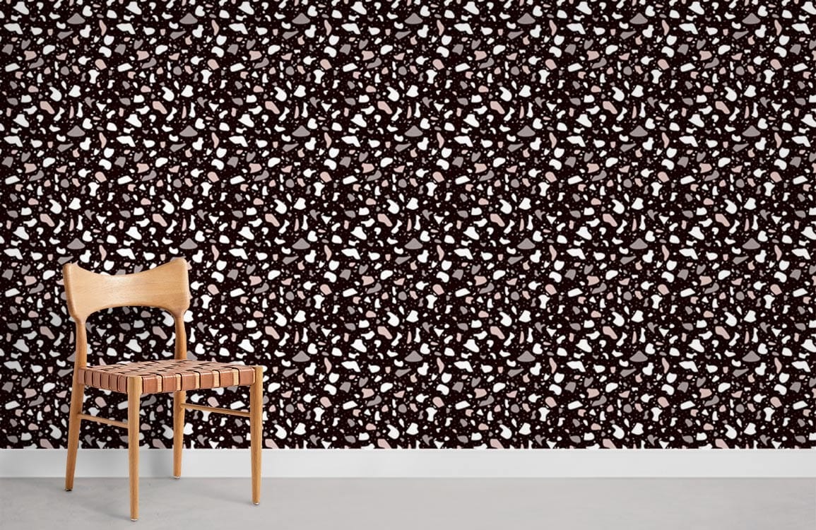 Terrazzo-inspired wallpaper, brown and white stone pattern, wooden chair, minimalistic room setting.