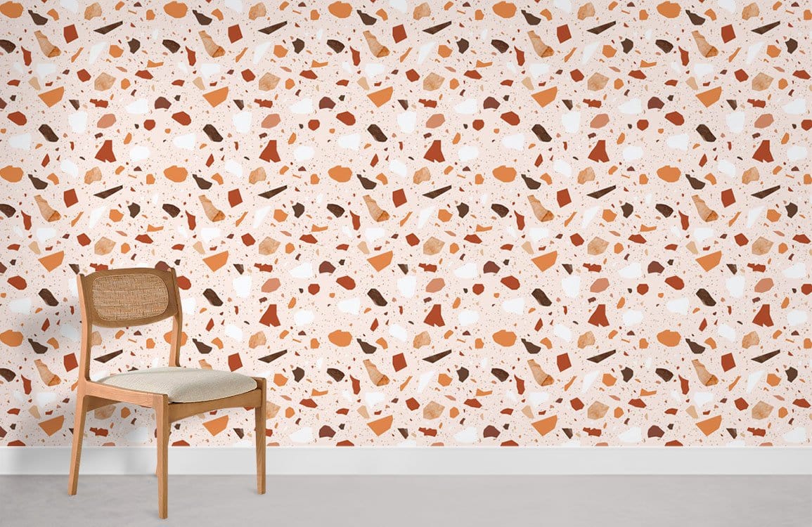 Earthy Terrazzo Pattern Wallpaper in warm tones, modern chair, neutral flooring, minimalist interior design.