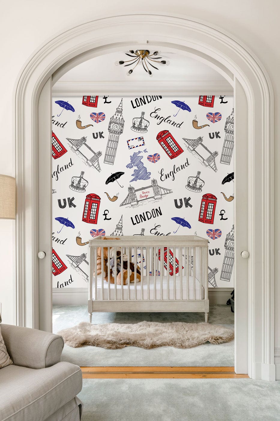 Vintage London Icons Wallpaper - British style, nursery with white crib, plush sofa, archway.