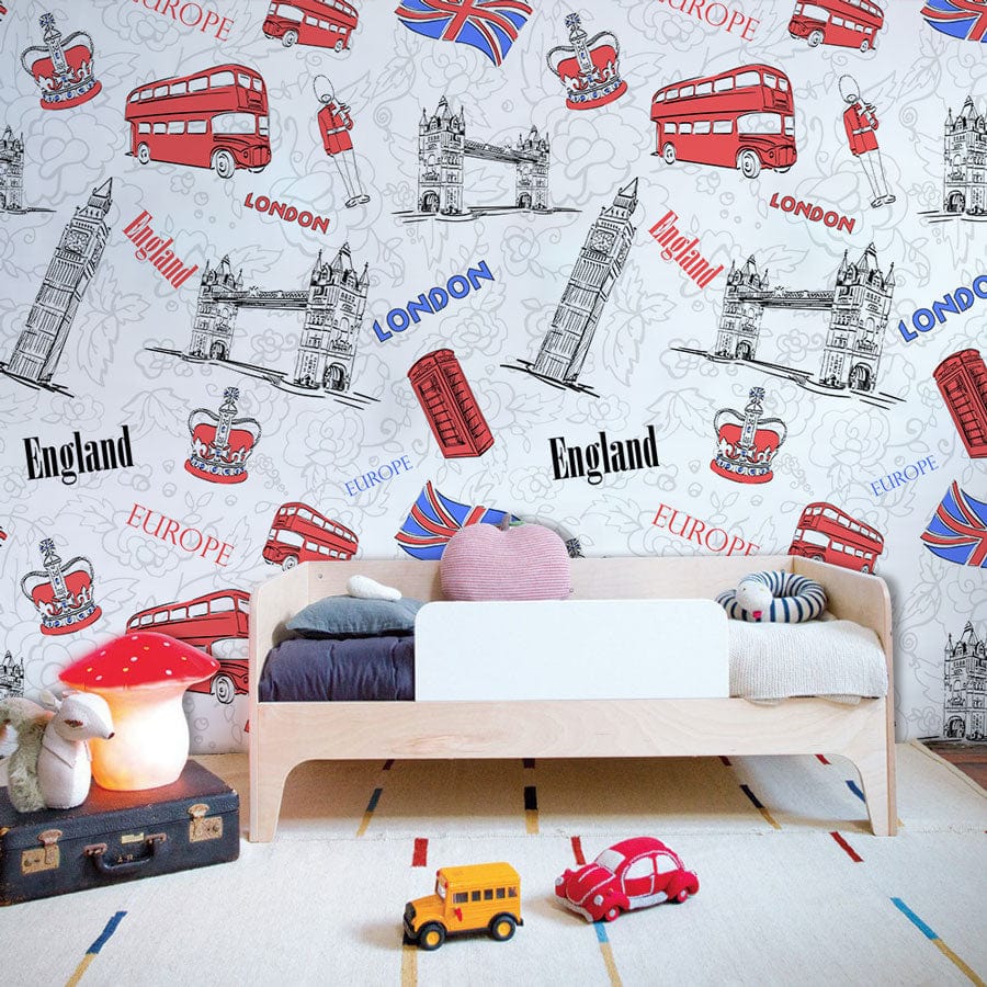 Kids' room with vintage London mural wallpaper, playful design featuring red buses, wooden bed, colourful toys.