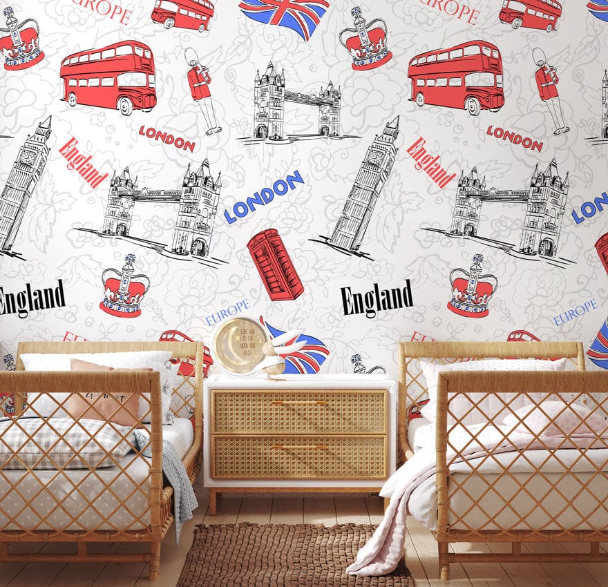 Vintage London-themed wallpaper in red and blue adorning a bedroom with neutral wicker furniture.