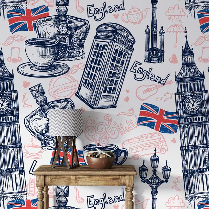 Vintage London wallpaper featuring Union Jack, Big Ben, telephone booth motifs, with wooden table, lamp.