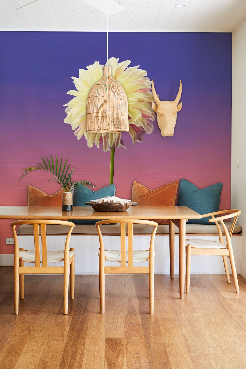 Elegant Yellow Dahlia Wallpaper in dining room with wooden chairs, Ombre Mural Background, and decorative mask.