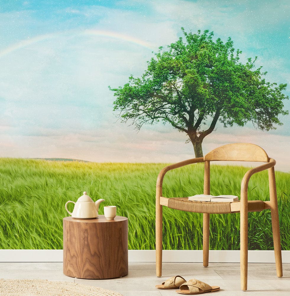 Tranquil green meadow mural wallpaper, wooden chair, round table, light flooring, serene room decor.